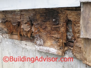 Poor flashing let to water intrusion and rot in the plywood sheathing and band joist beneath. The deck was only a few years old and looked terrific until it collapsed under the weight of a heavy snowfall. CLICK TO ENLARGE