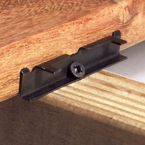 The Tiger Claw clip is hammered into place with an accessory block. Clips are available for hardwood, softwood, and slottedn decking. Courtesy of Grabber Construction Products