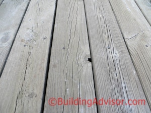 Pressure-treated decking checking and weathering