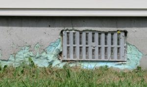 Failure of parging finish on foundation insulation