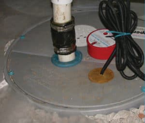 Sealed, gasketed lid on sump pit helps keep radon and moisture out of the basement. Source US DOE