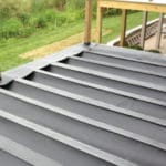 Dek Drain under-deck drainage system used EPDM sheeting to provide dry space under the deck.