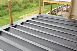 Dek Drain under-deck drainage system used EPDM sheeting to provide dry space under the deck.