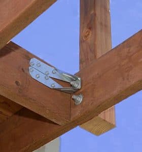 DTT2z steel connector from Simpson Strong Tie meets code requirements for installing deck railing posts.