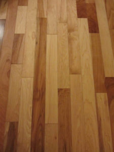 Lower grade cherry hardwood flooring can have lots of color variation and figure.