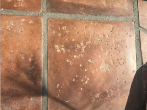 Exterior concrete tiles are deteriorating after six years, despite using the recommended sealant.