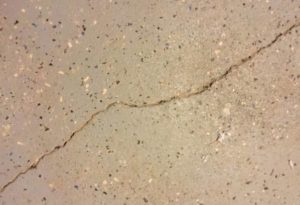 Hairline cracks in a concrete slab are normal and rarely a cause for concern.