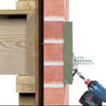 Simpson BVLZ bracket ties deck ledger to brick veneer