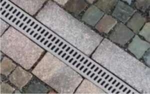 Channel drains can quickly remove water from paved patios or other landscaping.
